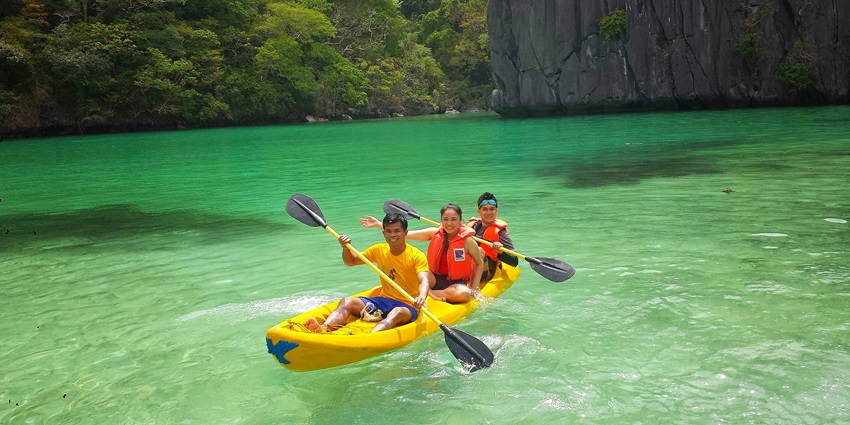 A glimpse of Kayaking in the stunning islands with crystal-clear waters and limestone cliffs.