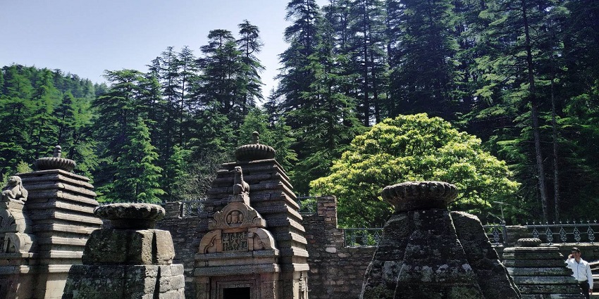 Explore Jageshwar Dham known for its intricate carvings and serene surroundings.