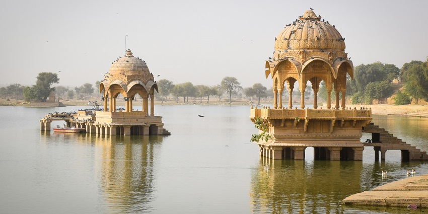 An image of Fort amidst lake in Jaisalmer, Rajasthan, one of the world's remaining living forts.