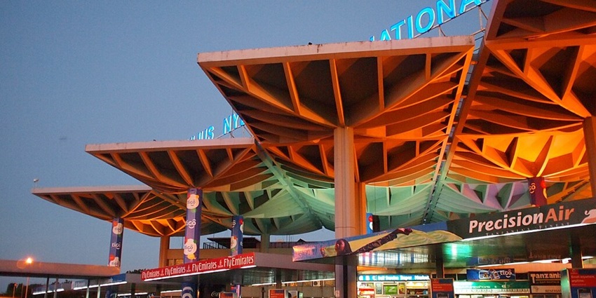 Entrance to the Julius Nyerere International Airports in Tanzania showing the roofs, airport name,