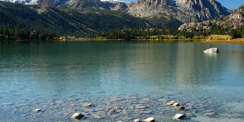 An image of June Lake with Sierra crest in California with a shoreline and hills