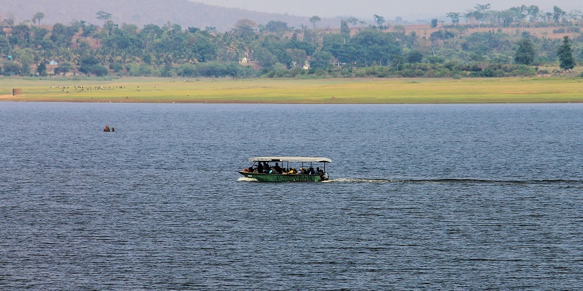 Waterwoods Lodge, Kabini, Karapura, surrounded by dense greenery and a peaceful landscape.
