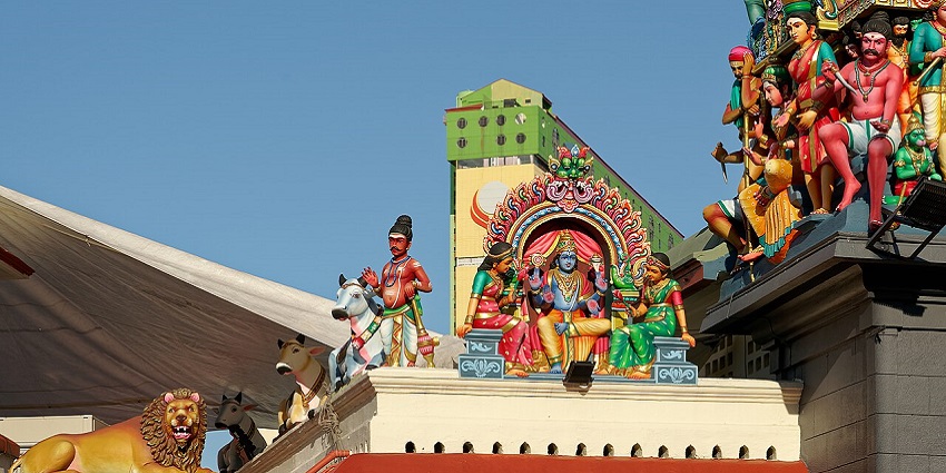 Top of the Sri Marriamman temple with detailed architecture and sculptures of gods