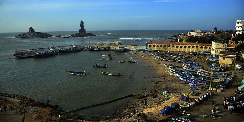 Beautiful sea coast of Kanyakumari, with many boats lining the shores.