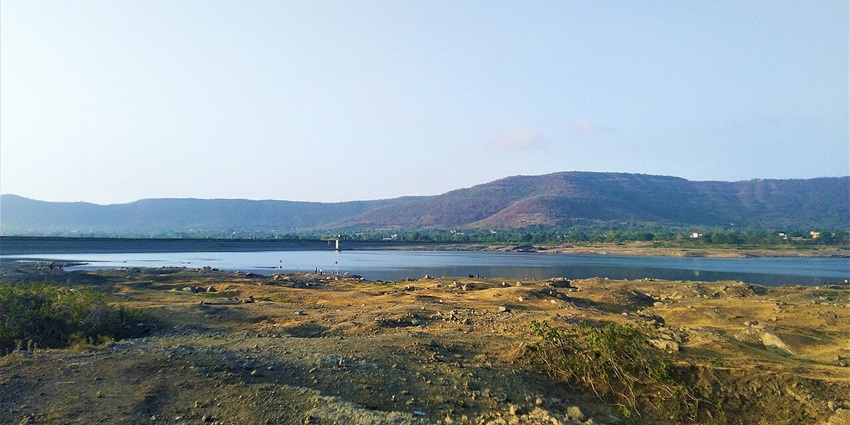A stunning reflection of a historic fort on one of the most famous lakes in Pune