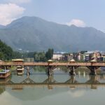 Zero bridge as seen from the Abdullah bridge, with the Zabarwan hills in the background, in Srinagar