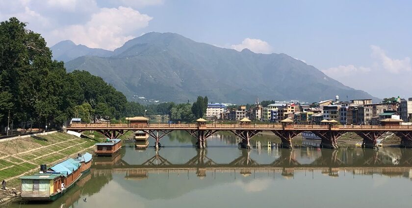 Zero bridge as seen from the Abdullah bridge, with the Zabarwan hills in the background, in Srinagar