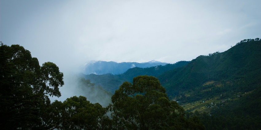 View of Kausani, a picturesque hill station offering sweeping views of the Himalayas.