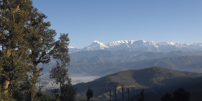 Scenic image of the lower Himalayan ranges from the hills of Kausani near Nainital