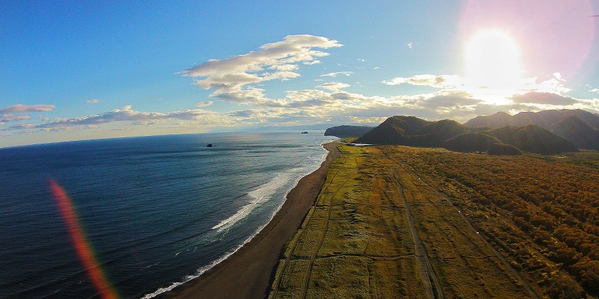 Black sand beach, among the famous nude beaches in Russia is known for unique landscapes and pristine waters.