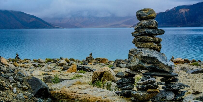 Image of Pangong Tso Lake gray rocks stacks on brown surface near the Khurnak Fort