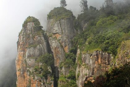 Magnificent pillars of rocks partially covered in mist in Kodaikanal, Tamil Nadu