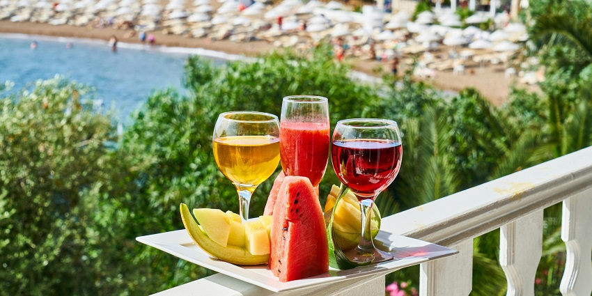 Enjoying the cocktails by the beach is a relaxing experience in vibrant Spain nightlife