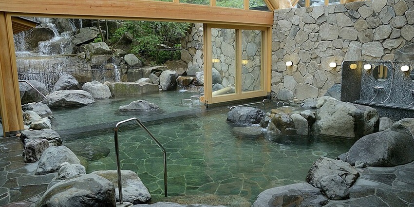 Relaxing hot spring bath at Kyoto Takenosato Onsen, blending nature and tradition