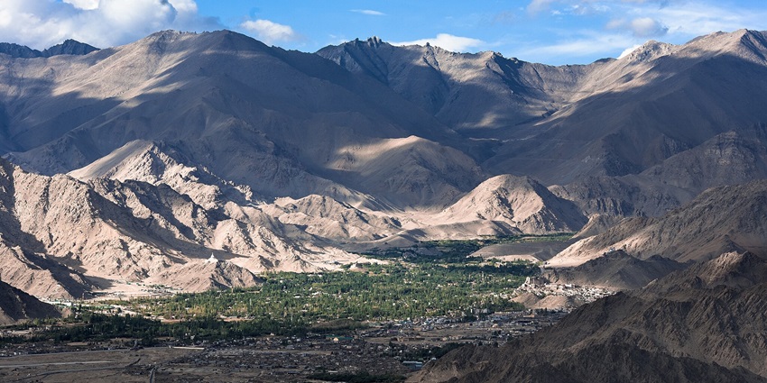 An image of the mountainous landscape of Ladakh, one of the best places to visit in August in North India
