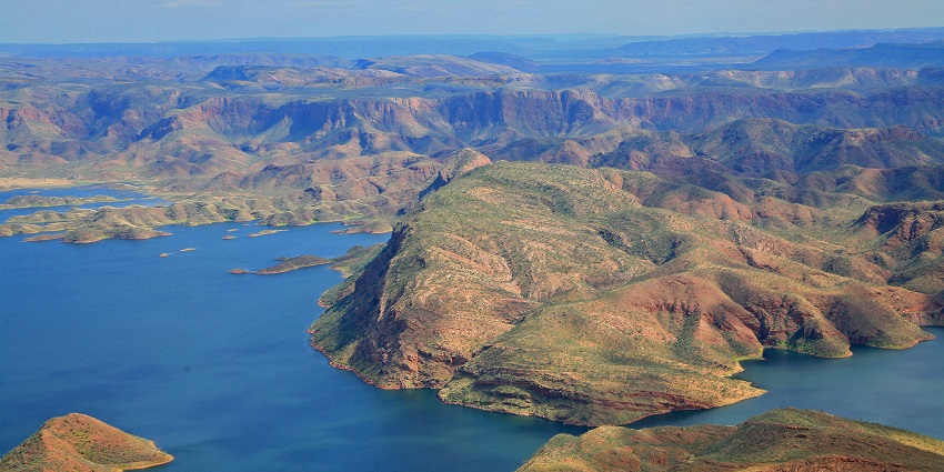 An image of Lake Argyle, one of the largest lakes in Australia, surrounded by rugged terrain