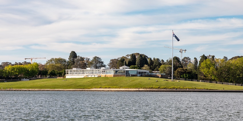 A picture of Lake Burley Griffin, scenic artificial lakes in Australia, surrounded by greenery
