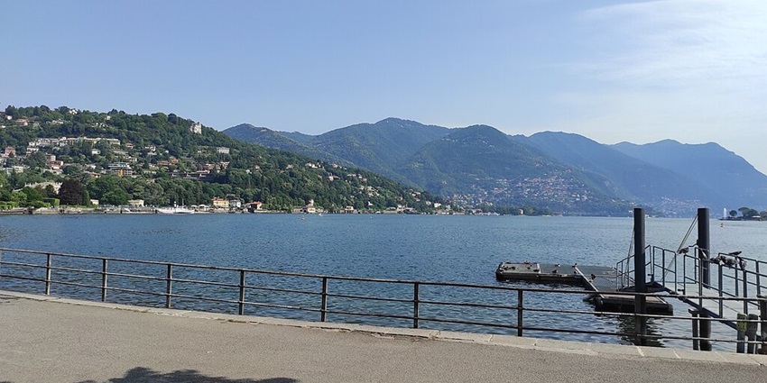 An image of Lake Como, Italy, showcasing its serene waters and stunning mountain backdrop.