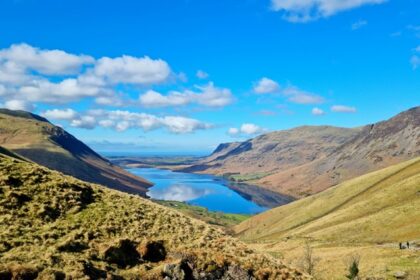 An image of Scenic Lake District National Park with lakes, hills, and charming villages