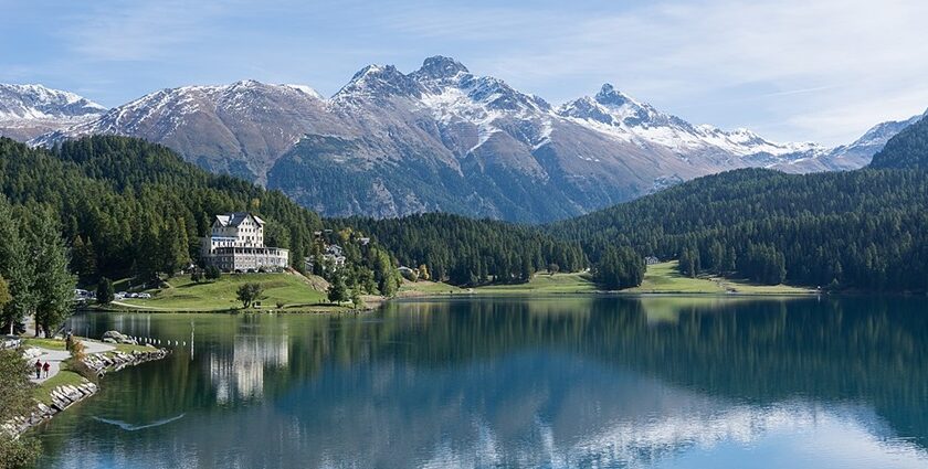 An image of Lake St. Moritz, Switzerland, with stunning alpine views and clear blue waters.