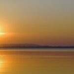 An image of Chiemsee, an eye pleasing lake in Germany in the evening at the of sunset