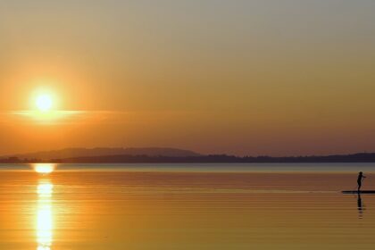 An image of Chiemsee, an eye pleasing lake in Germany in the evening at the of sunset