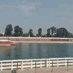 Haryana Tourism restaurant on Damdama Lake with calm waters and lush greenery around.