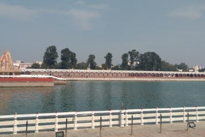 Haryana Tourism restaurant on Damdama Lake with calm waters and lush greenery around.