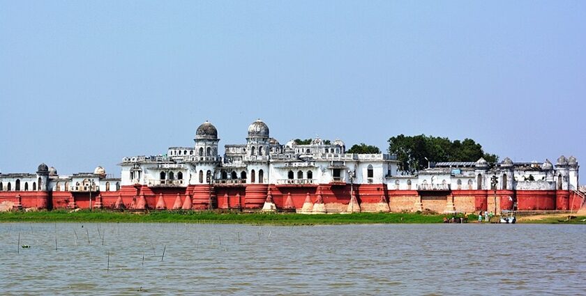 Lake in Tripura with a bright red and white neer mahal with its unique architecture