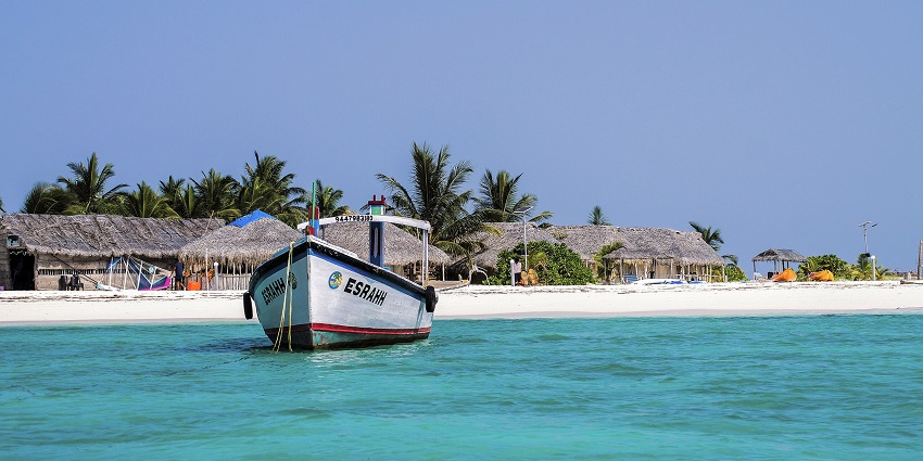 An image of Bangaram Island, Lakshadweep, India, featuring clear blue waters and sandy beaches.