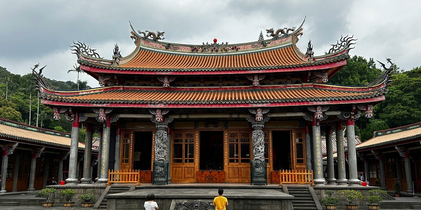 Image of a Langmu Temple where devotees are praying