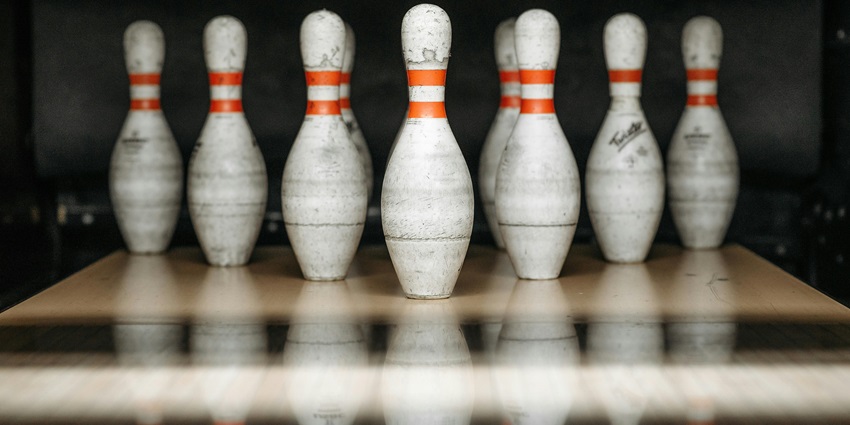 Image of white and red bowling pins displayed in Lao Bowling Center, Vientiane