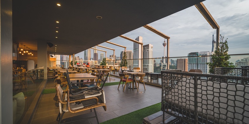 An image of a rooftop setting similar to Lidkoeb capturing the vibe of Copenhagen Nightlife