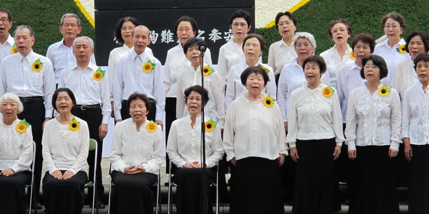 Choir of Hibakusha singing ‘Never again’ at Nagasaki Atomic Bom Museum in Japan.