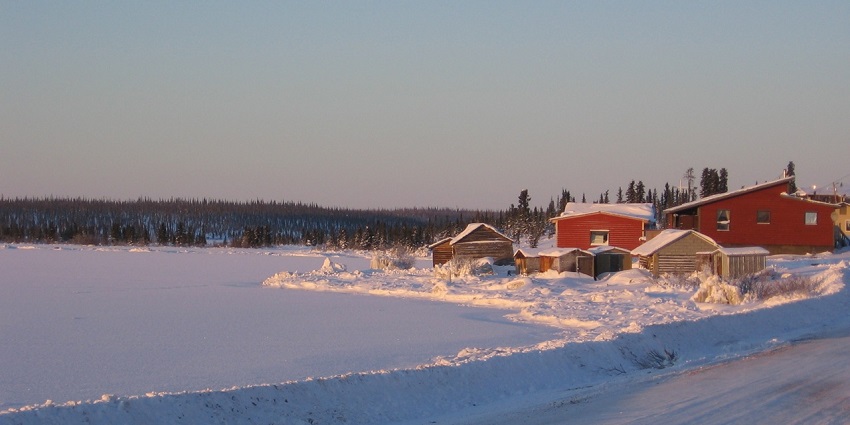 Snow-covered shore of the largest lake in Canada and small buildings and huts.
Viewers of this file can see comments and suggestions