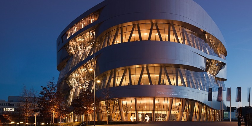 An image showing the iconic exterior of the Mercedes-Benz Museum in Stuttgart, Germany.