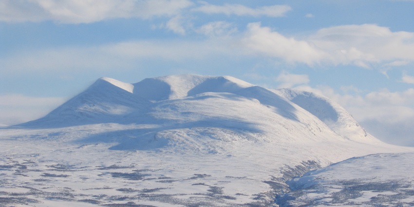 An image showing the panoramic view of Abisko National Park, Sweden, from the summit of Mt. Nuolja