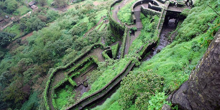 Rajdher Fort in Dhule offers breathtaking hilltop views, surrounded by vibrant greenery