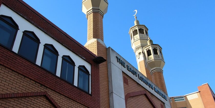 A stunning low-angle shot of East London Mosque, one of the holiest London Mosques highlighting its minaret