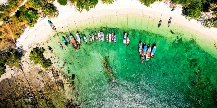 Bahamas Islands with dramatic cliffs, white sandy beaches, and stunning blue water caves.