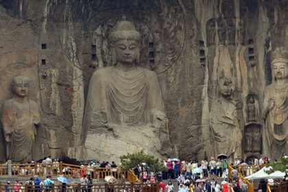 Witness the supreme art of buddhist sculptures at Longmen Caves.