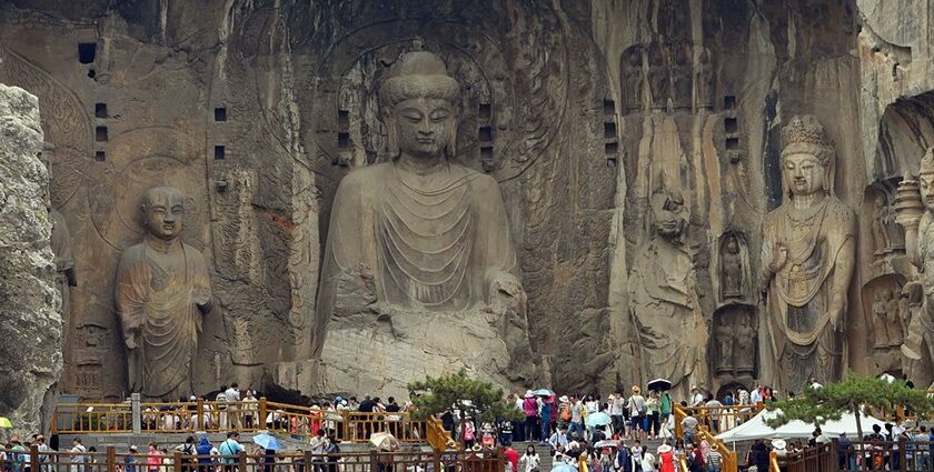 Witness the supreme art of buddhist sculptures at Longmen Caves.