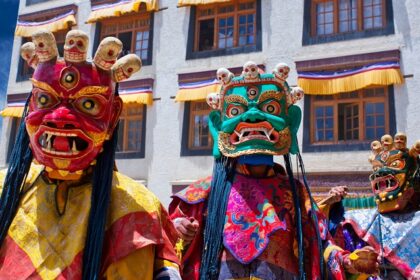 Performers dressed in traditional clothes gear up for the Ghatu Dance on Tamu Lohsar