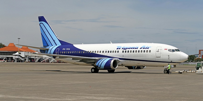 White and blue plane in Luang Namtha Airport.