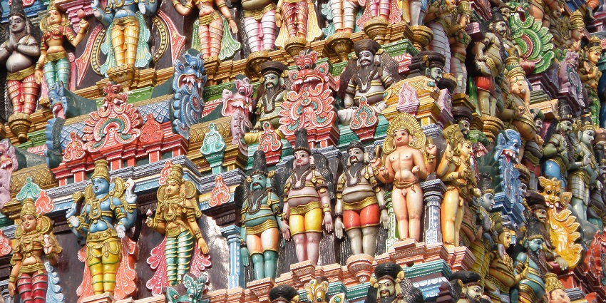 An image showing the famous Meenakshi Temple's intricate architecture around the walls.