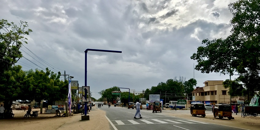 An image of a pedestrian crossing the road to Madurai in Rameswaram.