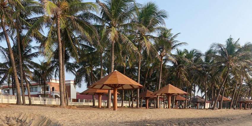 Tranquil waters reflecting the sky at beaches in South India