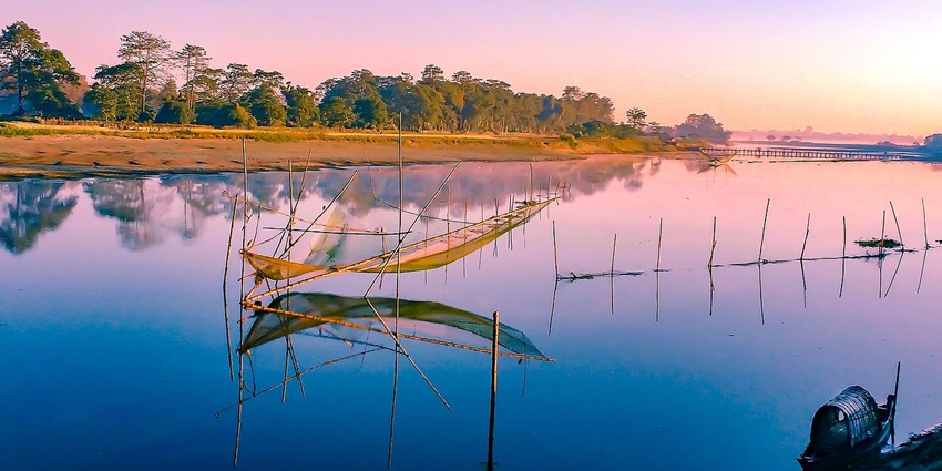 A scenic river view of Majuli, the world’s largest river island, and a peaceful place to travel in the Northeast in December.