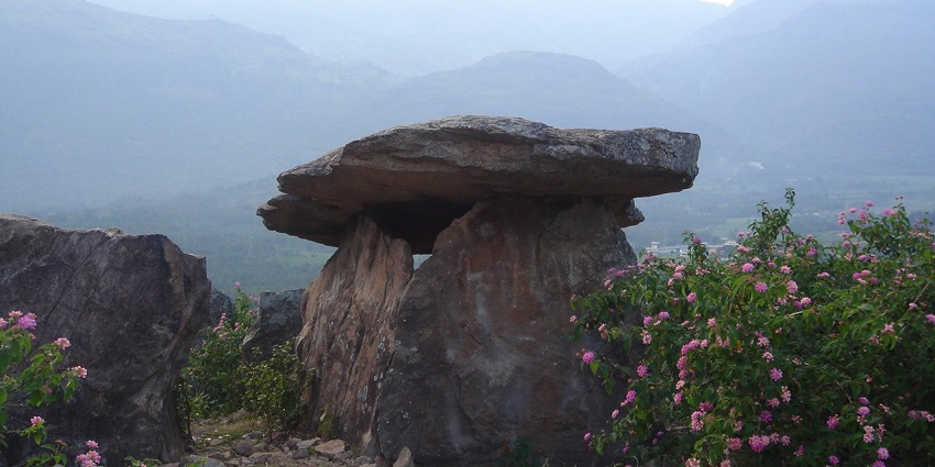 A shelter-like structure made of loose rocks is in Marayoor Sandalwood Forests near Munnar, Kerala.
