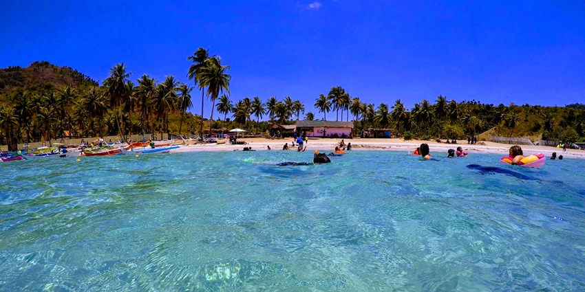 Masasa Beach is a peaceful beach with crystal-clear waters and scenic mountain views.